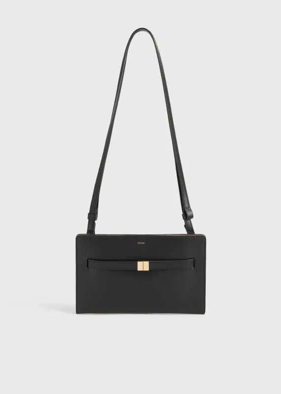 Belted leather crossbody black sold by Toteme