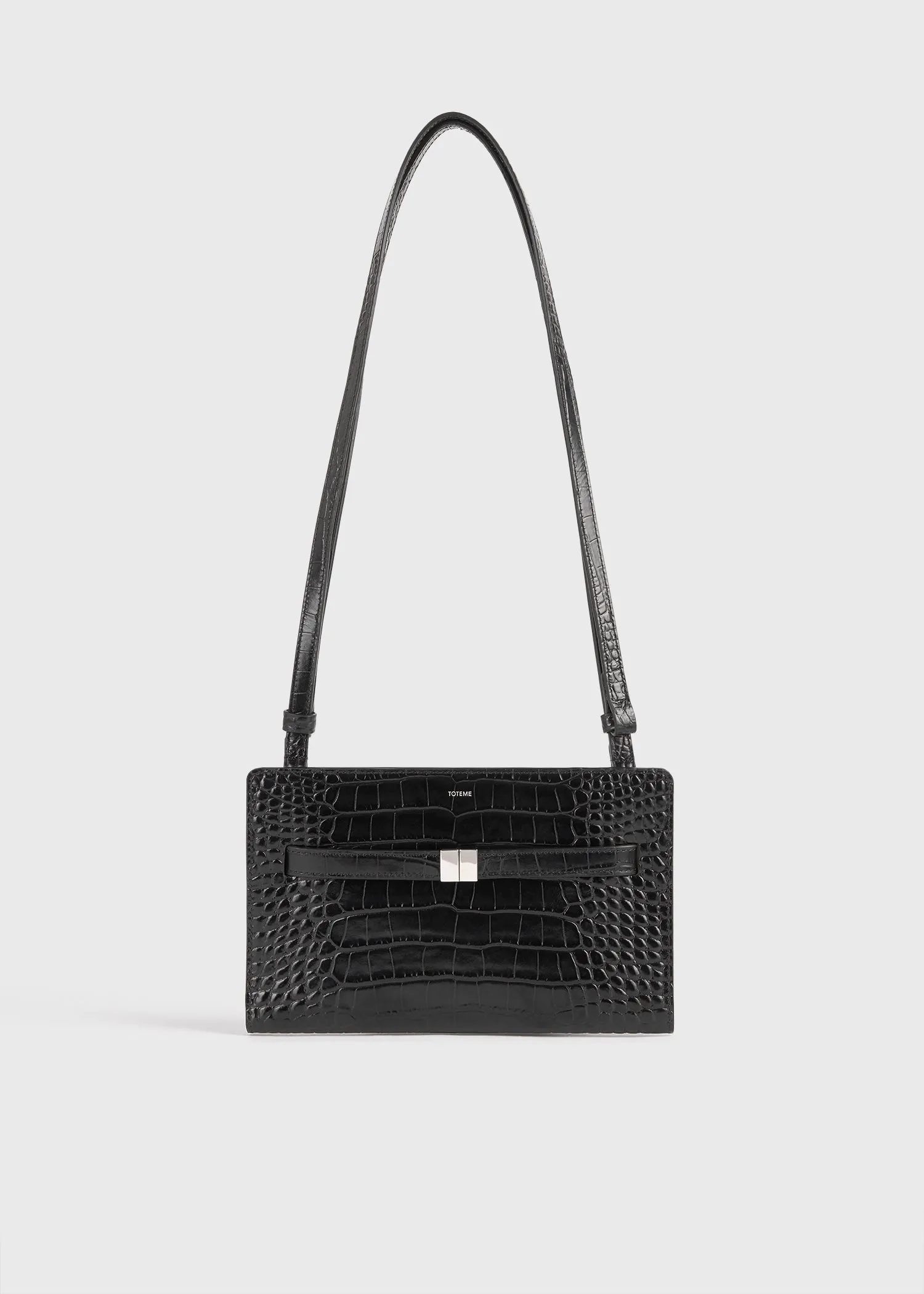 Belted croco-embossed crossbody black sold by Toteme