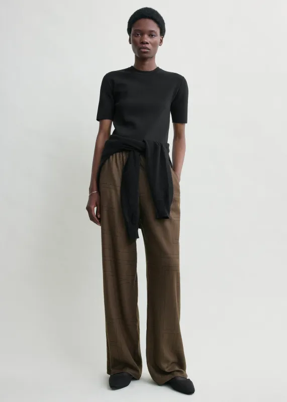 Monogram flannel pj bottoms dark brown sold by Toteme