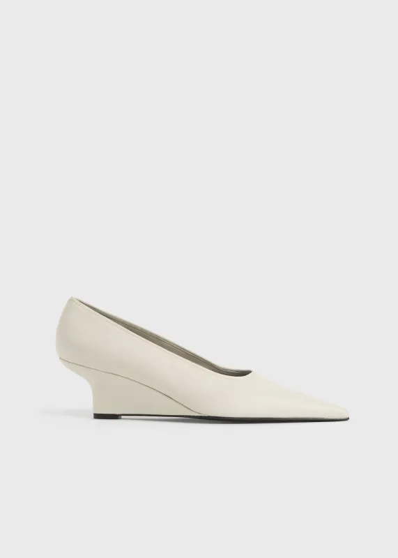 Sharp nappa wedge pumps white sold by Toteme