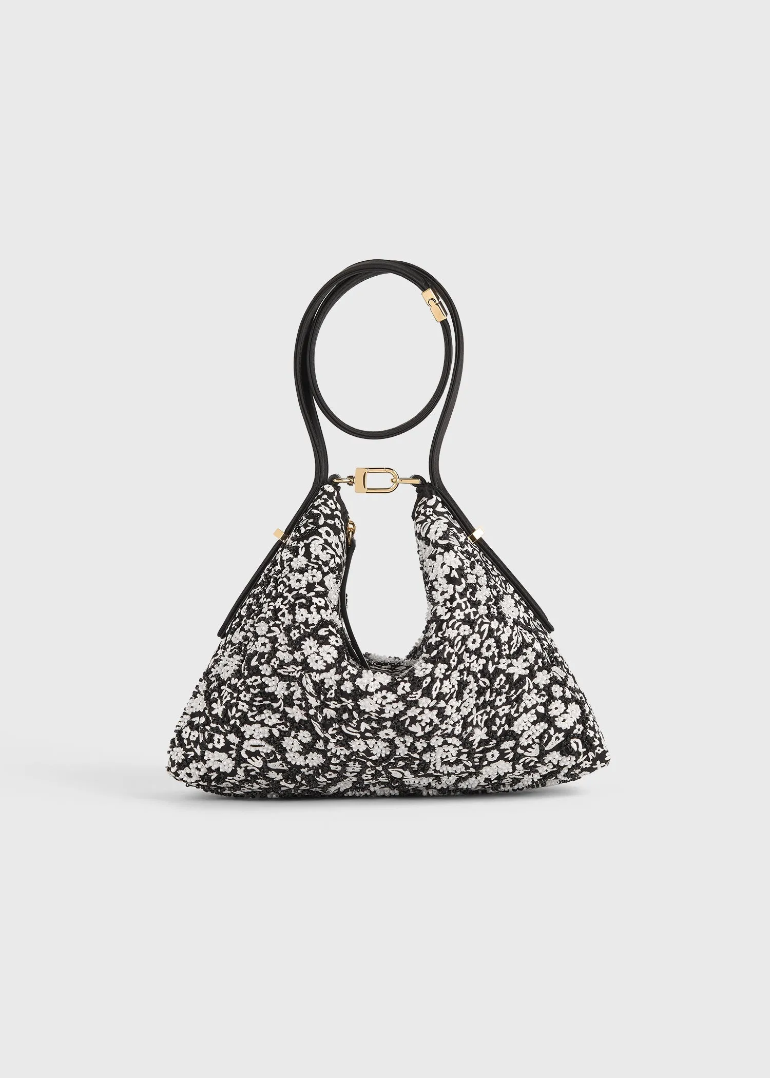 Bevel floral wristlet black/white sold by Toteme
