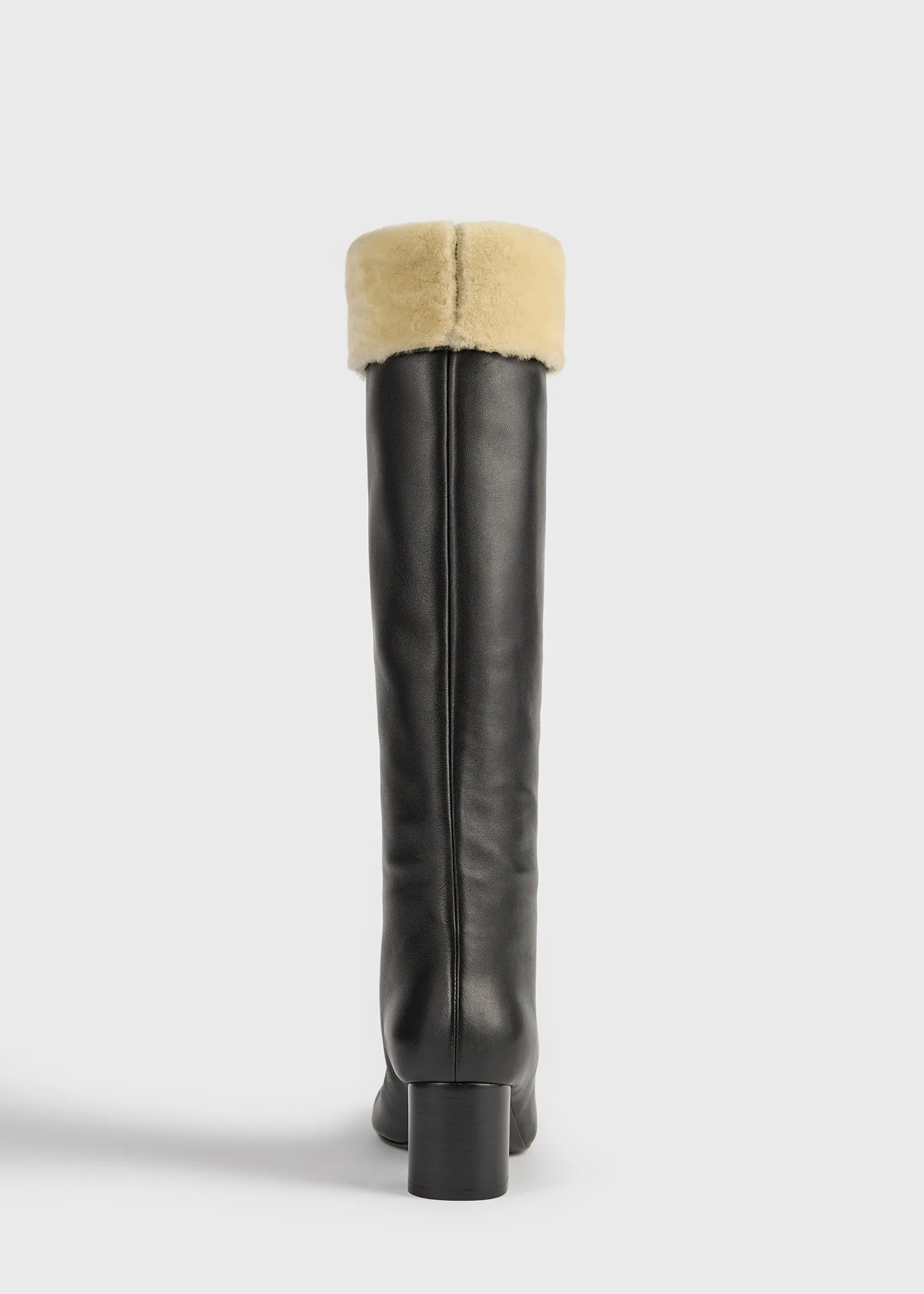 Downtown shearling knee-high boots black/beige sold by Toteme product image thumbnail 4