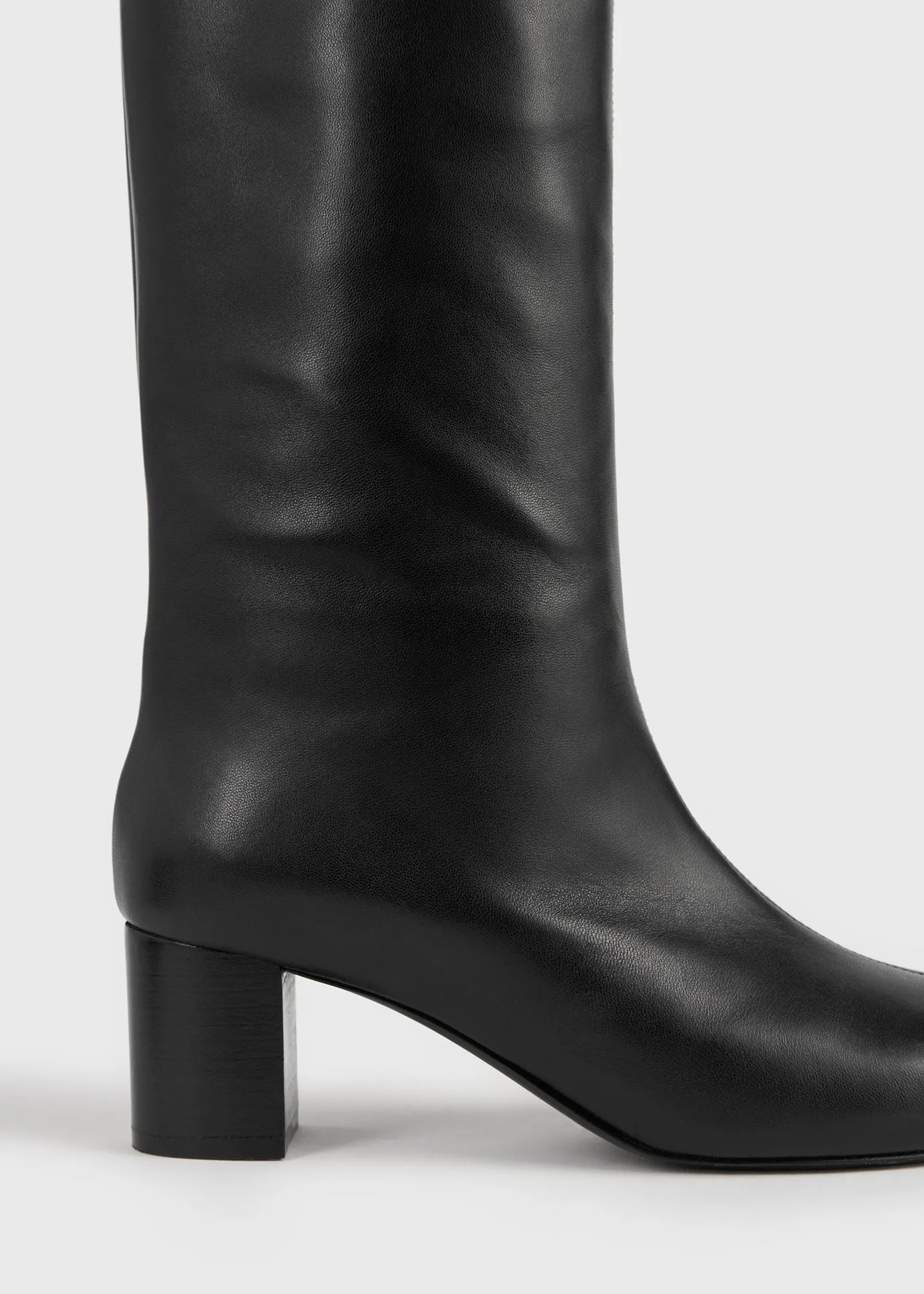 Downtown shearling knee-high boots black/beige sold by Toteme product image thumbnail 5