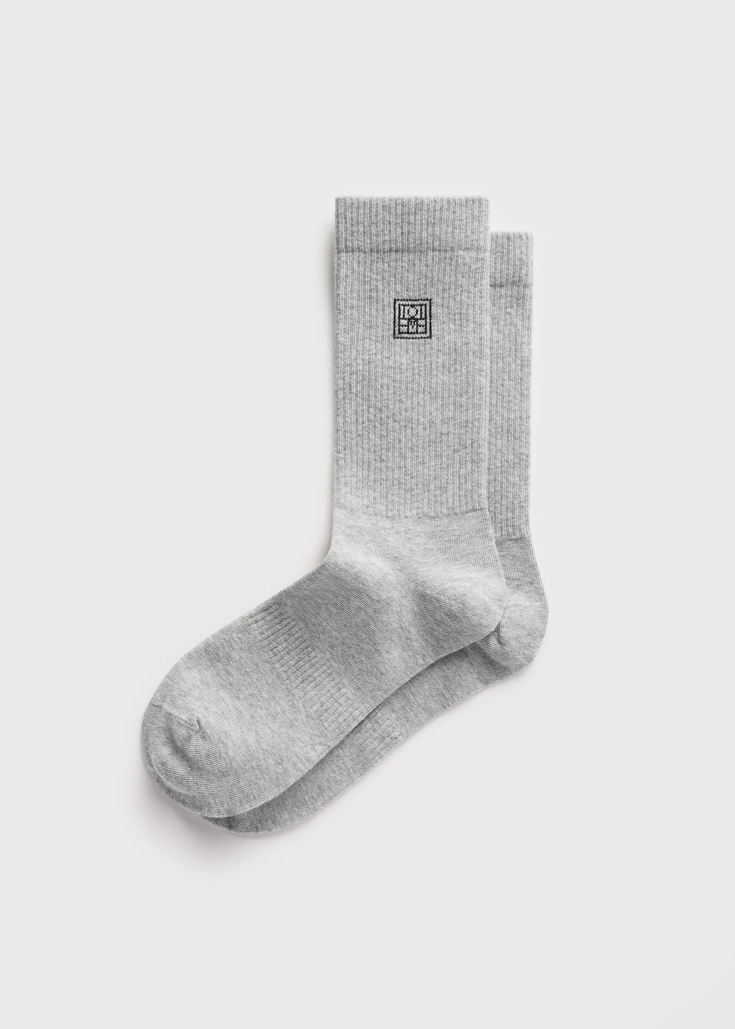 Monogram socks light grey sold by Toteme