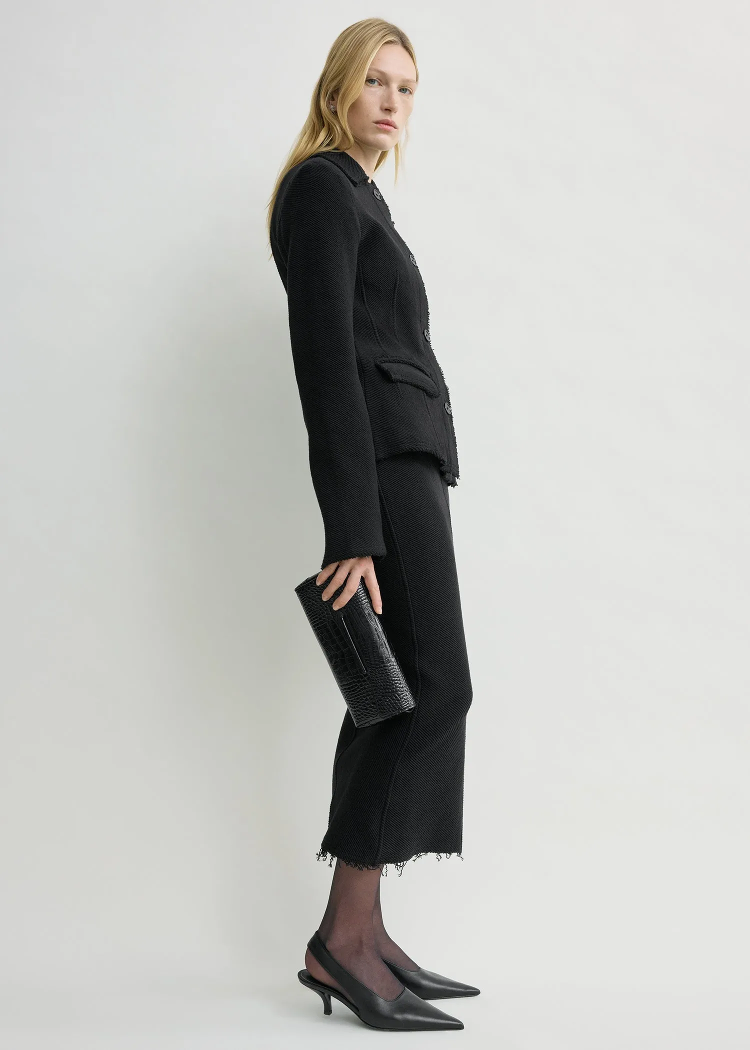 Raw hem cotton jacket black sold by Toteme