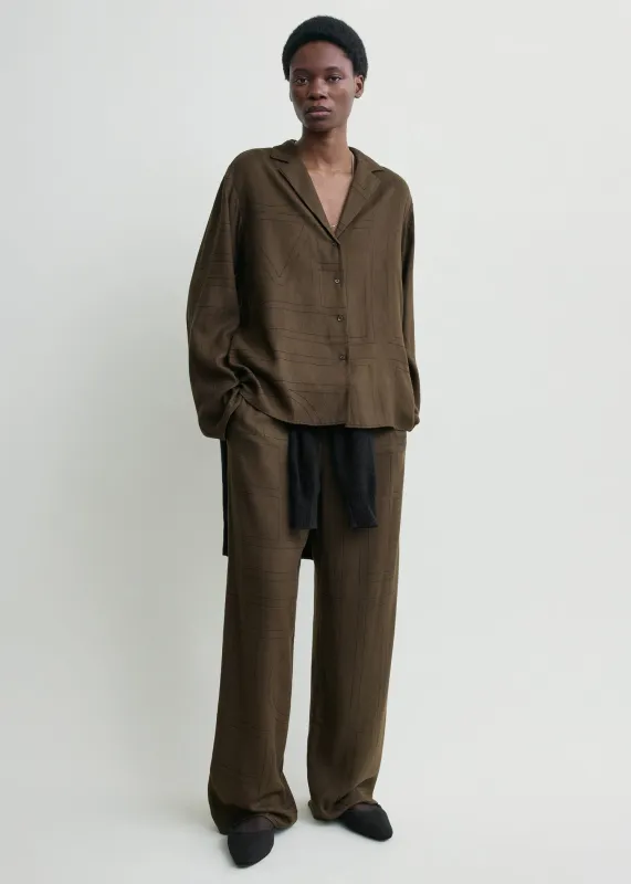 Monogram flannel pj top dark brown sold by Toteme