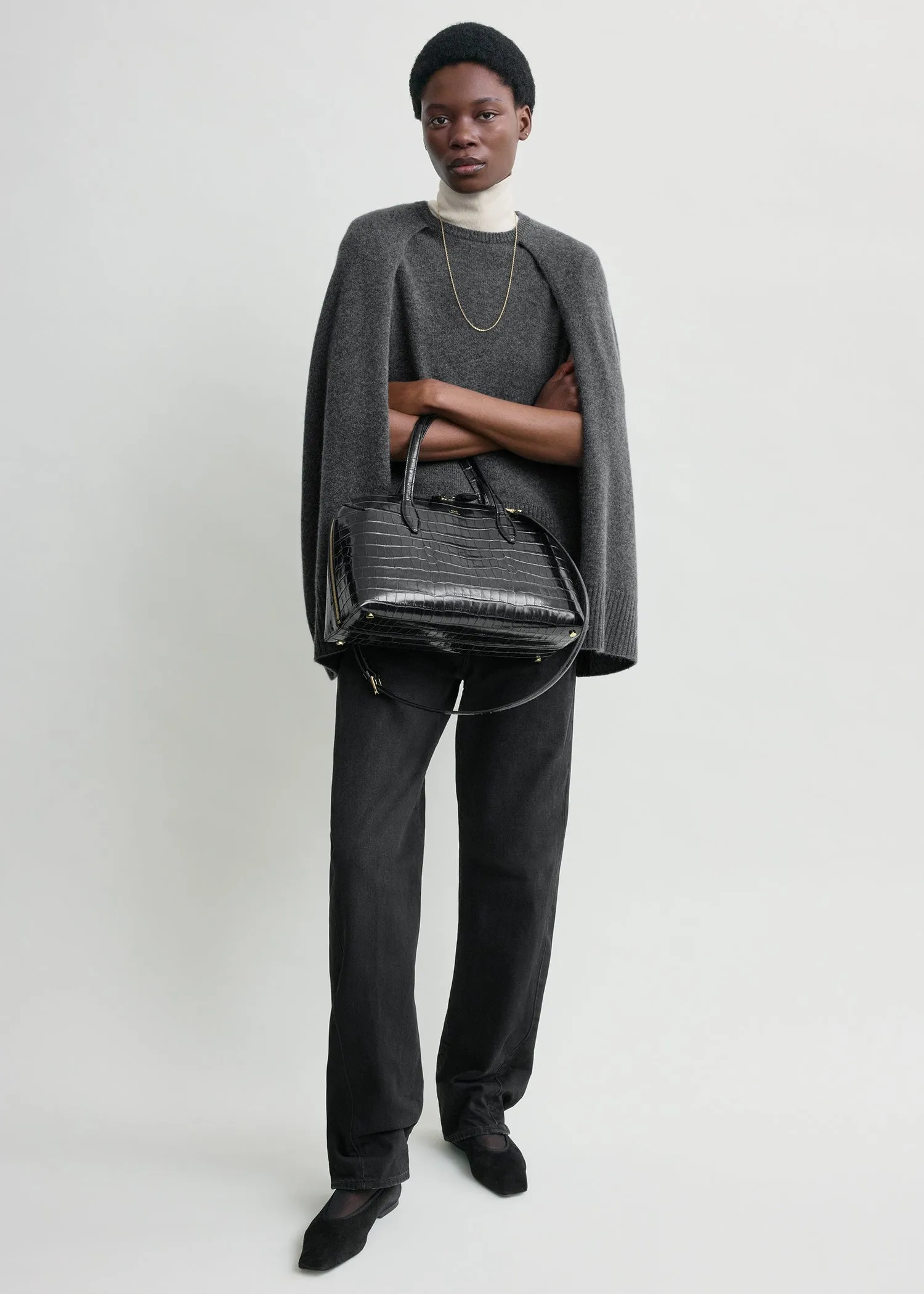 Crew cape knit dark grey sold by Toteme