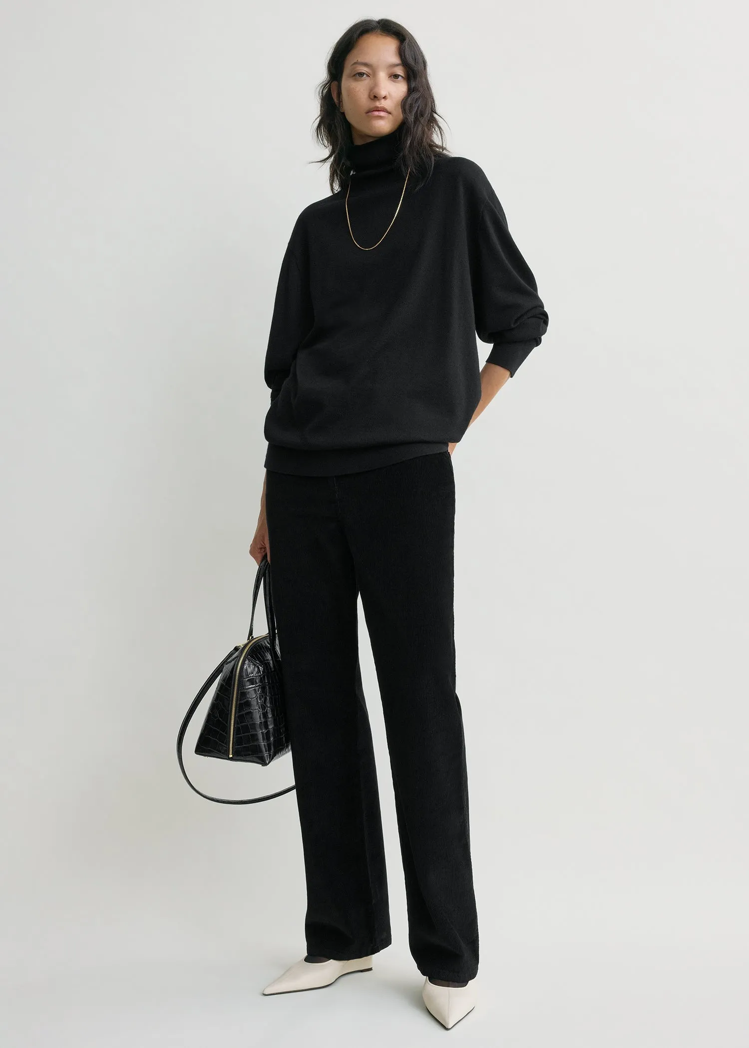 Straight cord trousers black sold by Toteme