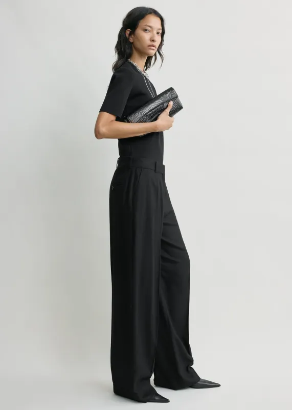 Wide flannel trousers black sold by Toteme