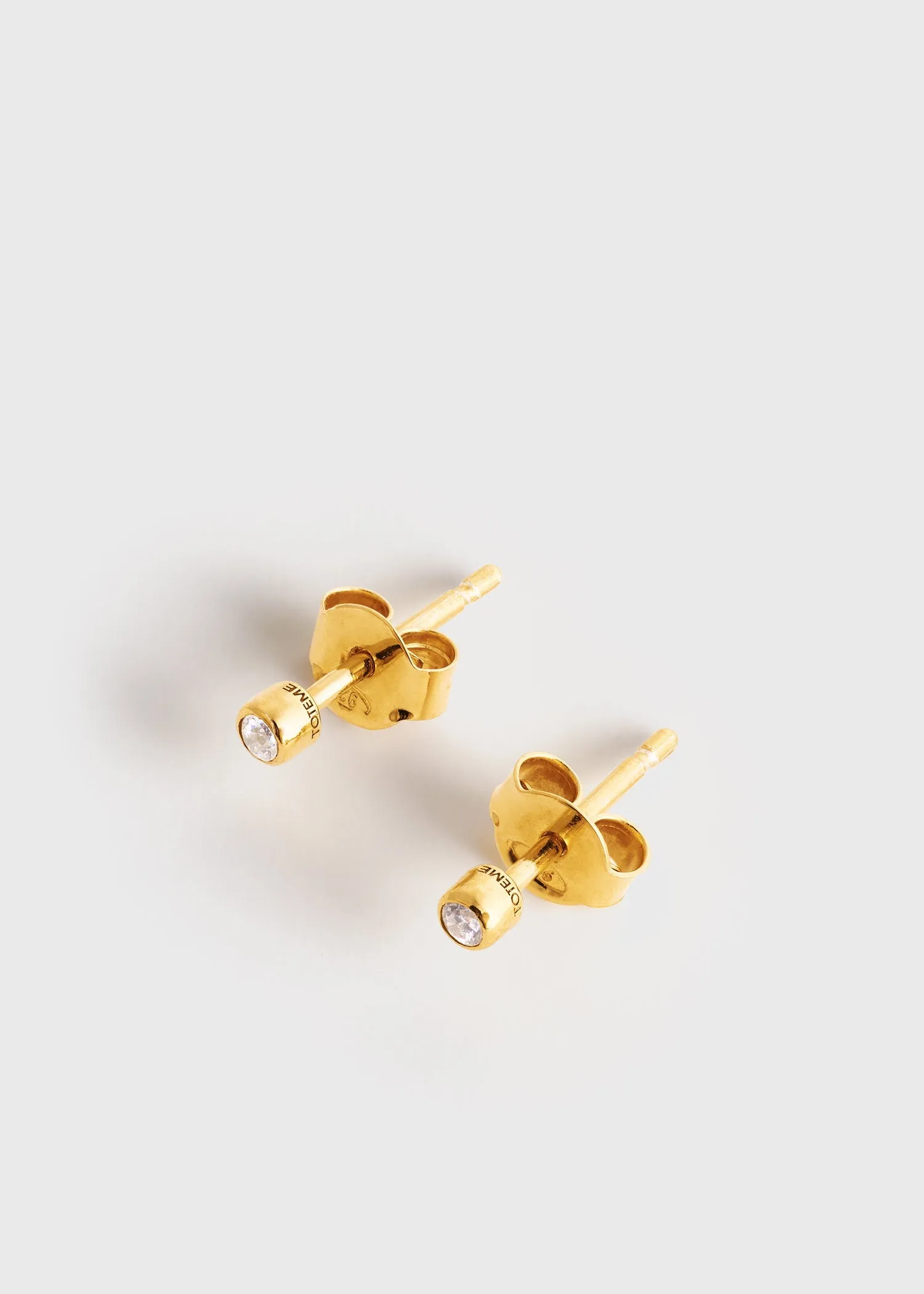 Mini diamond studs gold sold by Toteme product image thumbnail 4