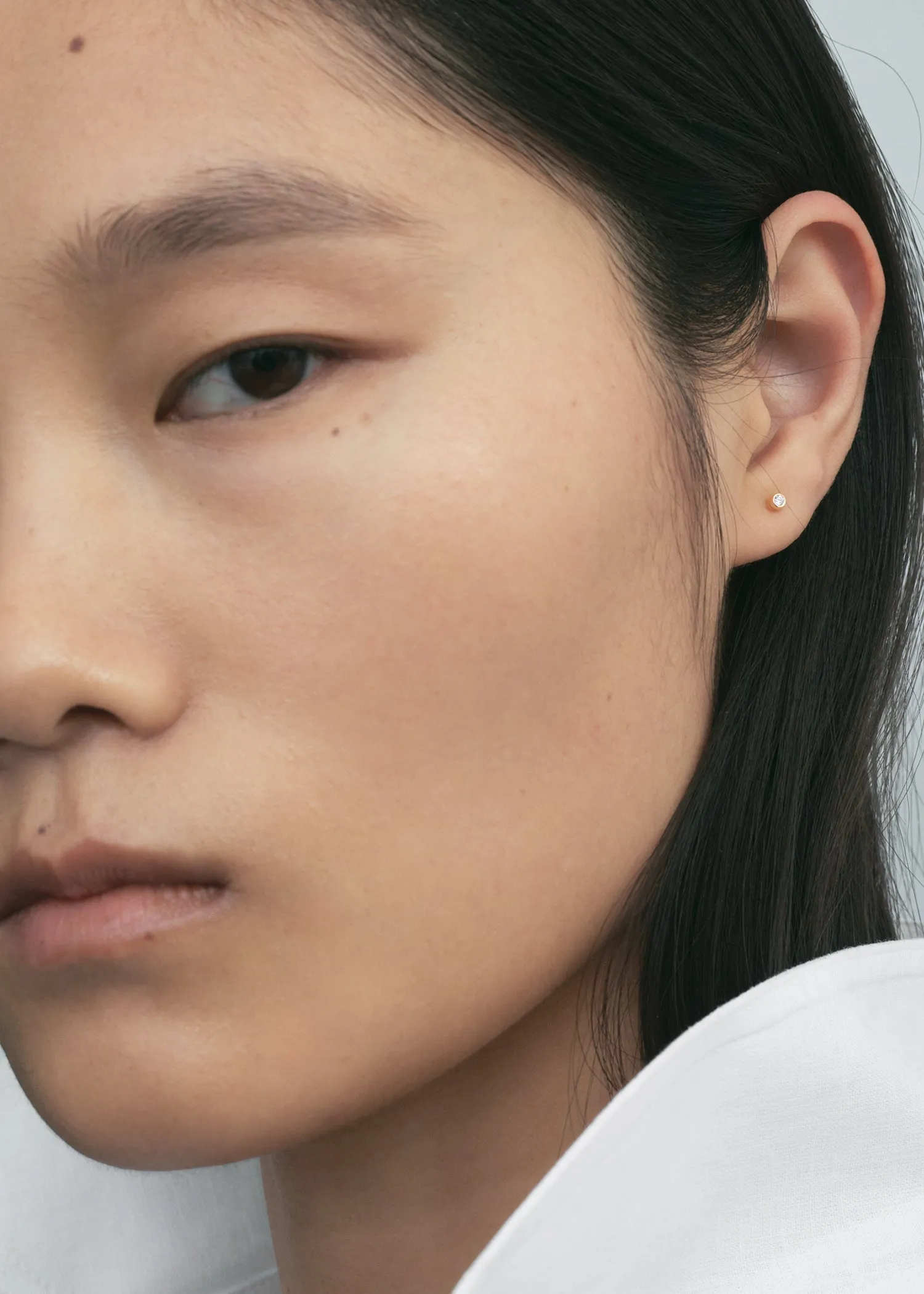 Mini diamond studs gold sold by Toteme product image thumbnail 2