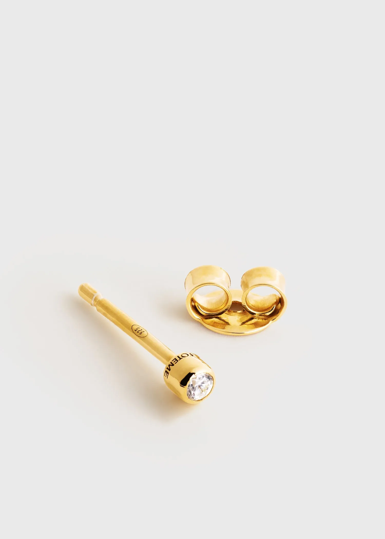 Mini diamond studs gold sold by Toteme product image thumbnail 3