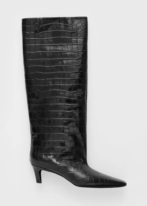 The Wide shaft boot black croco sold by Toteme