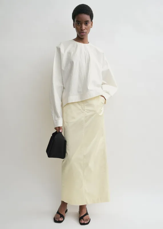 Batwing top off-white sold by Toteme