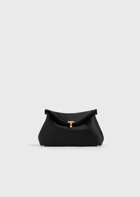Mini T-lock frayed satin clutch black sold by Toteme