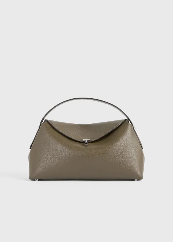 T-lock grained-leather top handle dark taupe sold by Toteme
