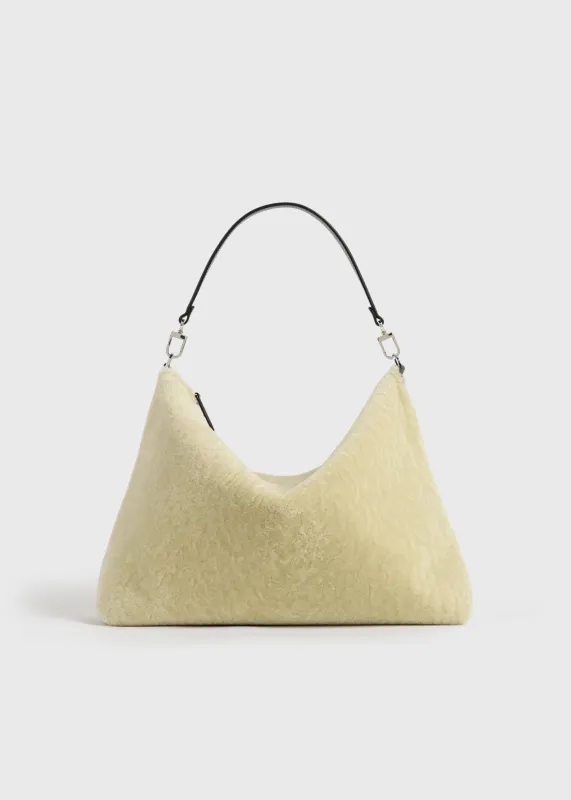 Medium Bevel shearling bag beige made by Toteme