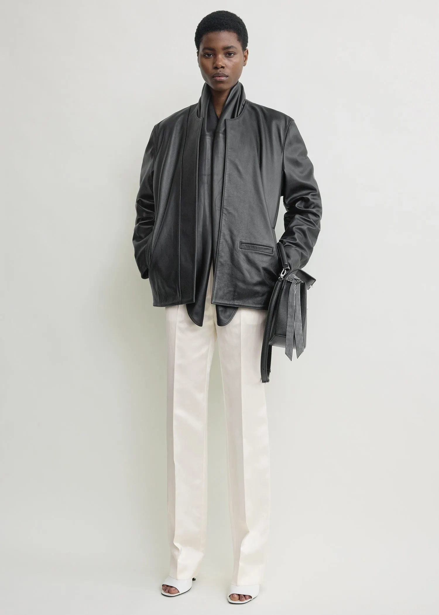 Minimal biker jacket black sold by Toteme