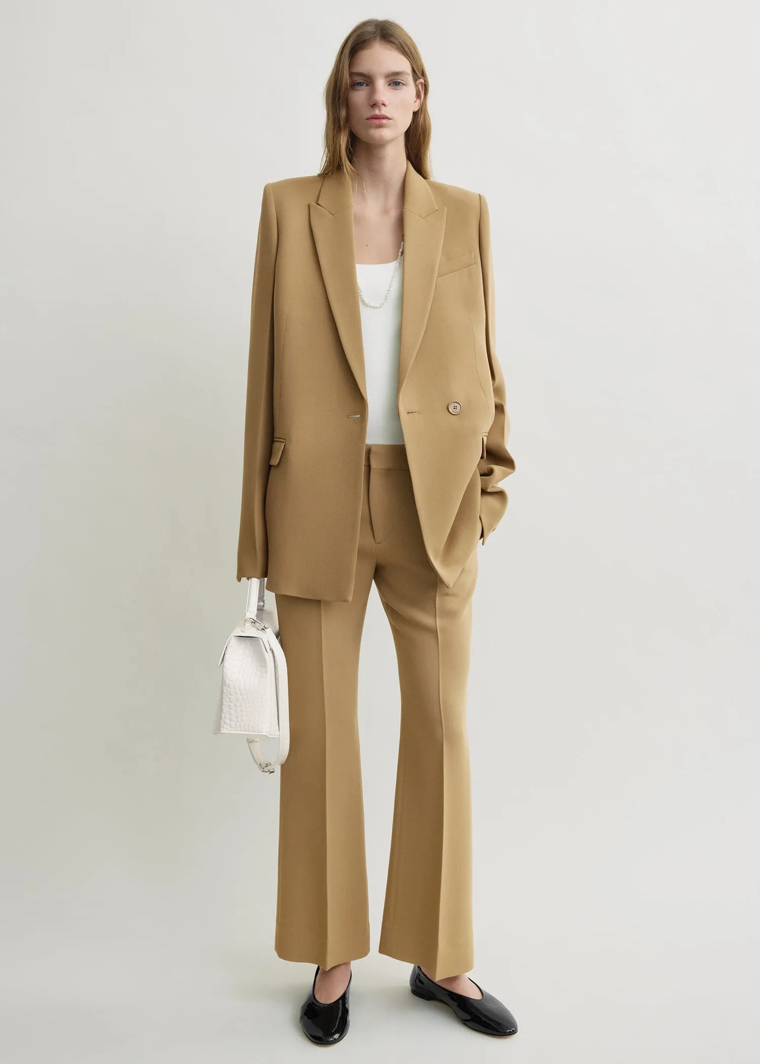 Slim tailored blazer beige sold by Toteme