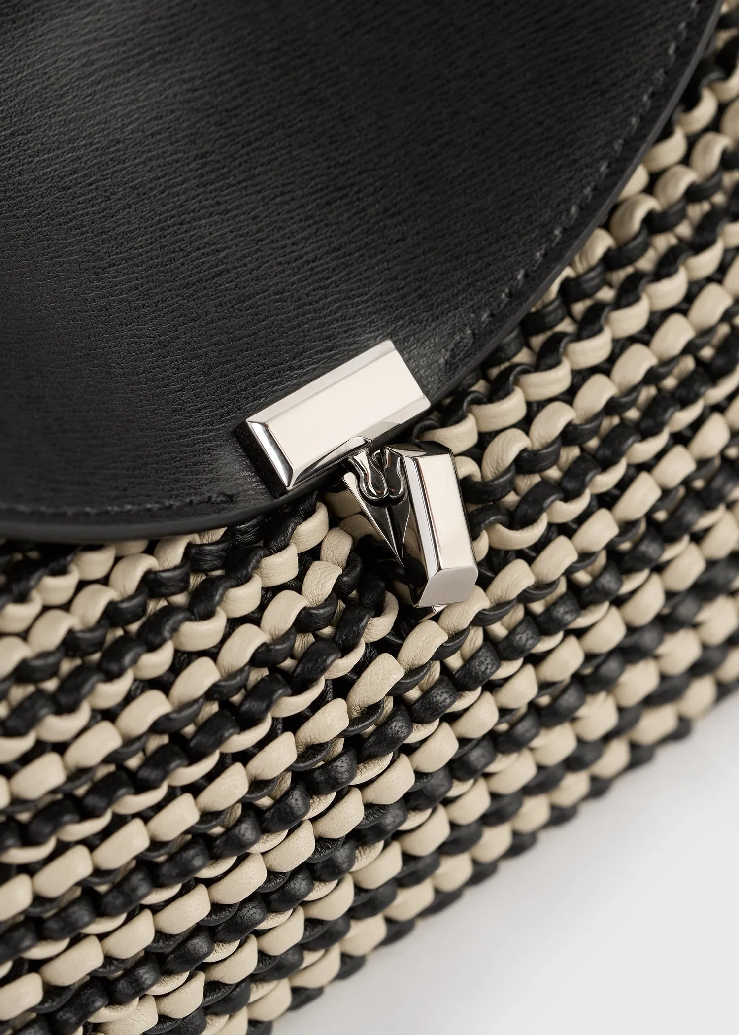 Mini T-lock woven-leather clutch black/sand sold by Toteme product image thumbnail 5