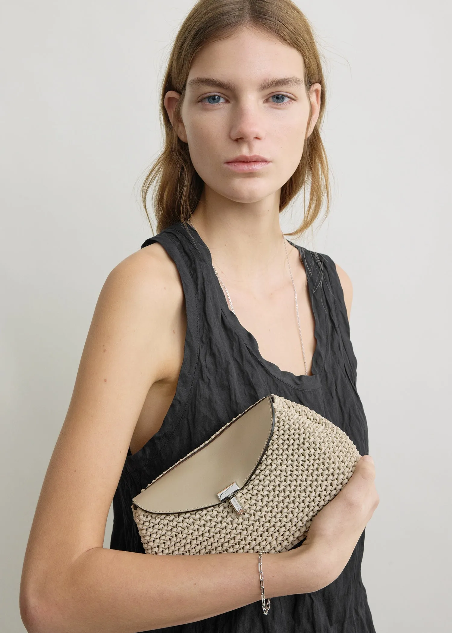 Mini T-lock woven-leather clutch fawn sold by Toteme product image thumbnail 3