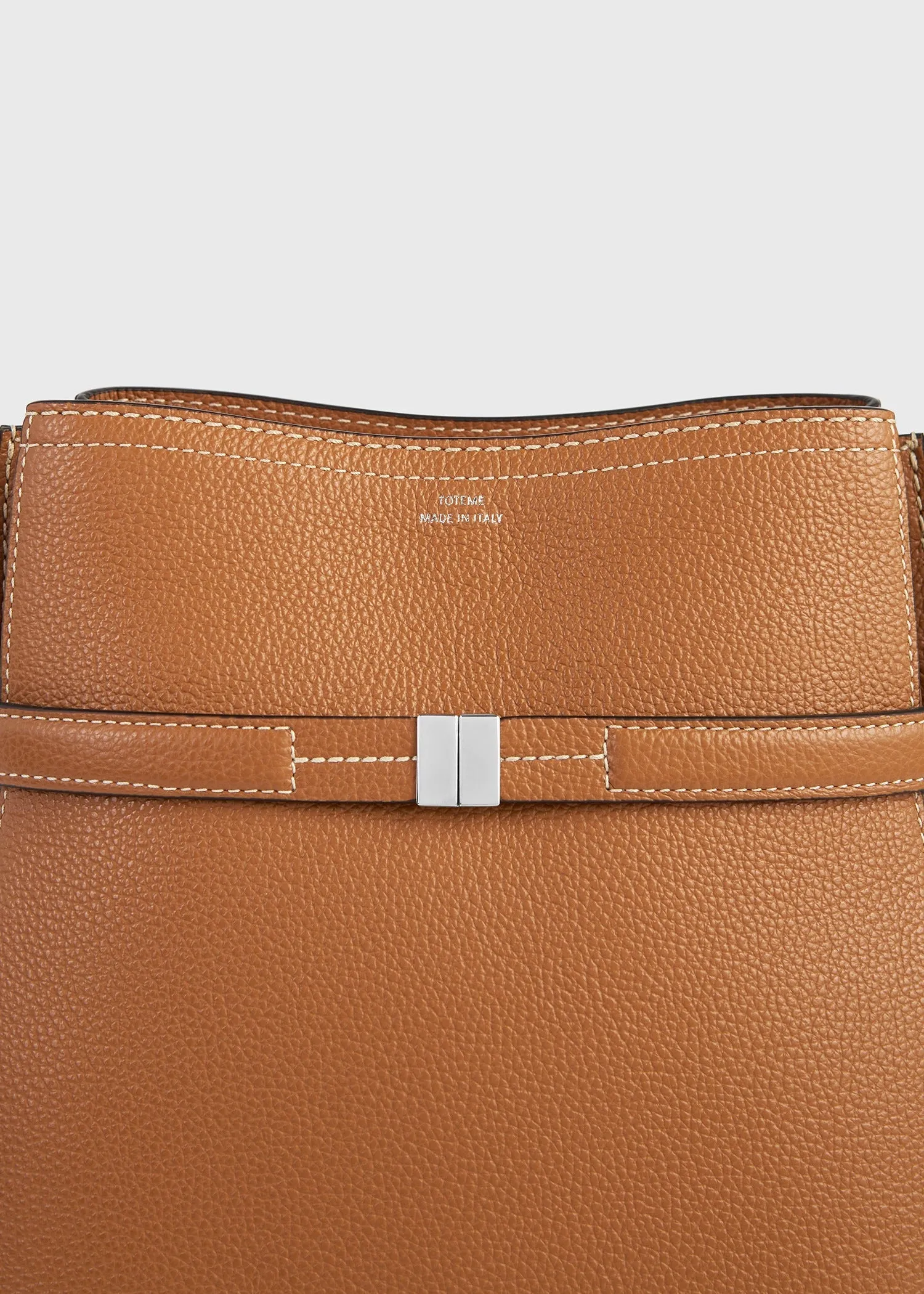 Belted grained-leather bucket bag tan sold by Toteme product image thumbnail 5