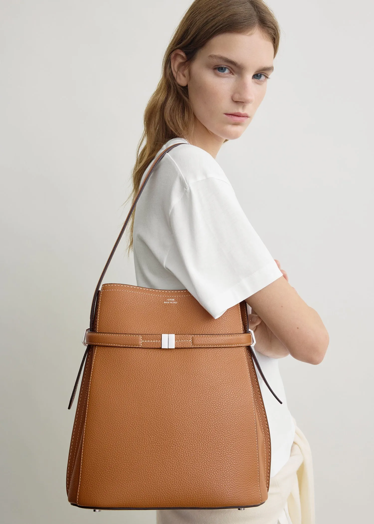 Belted grained-leather bucket bag tan sold by Toteme product image thumbnail 2