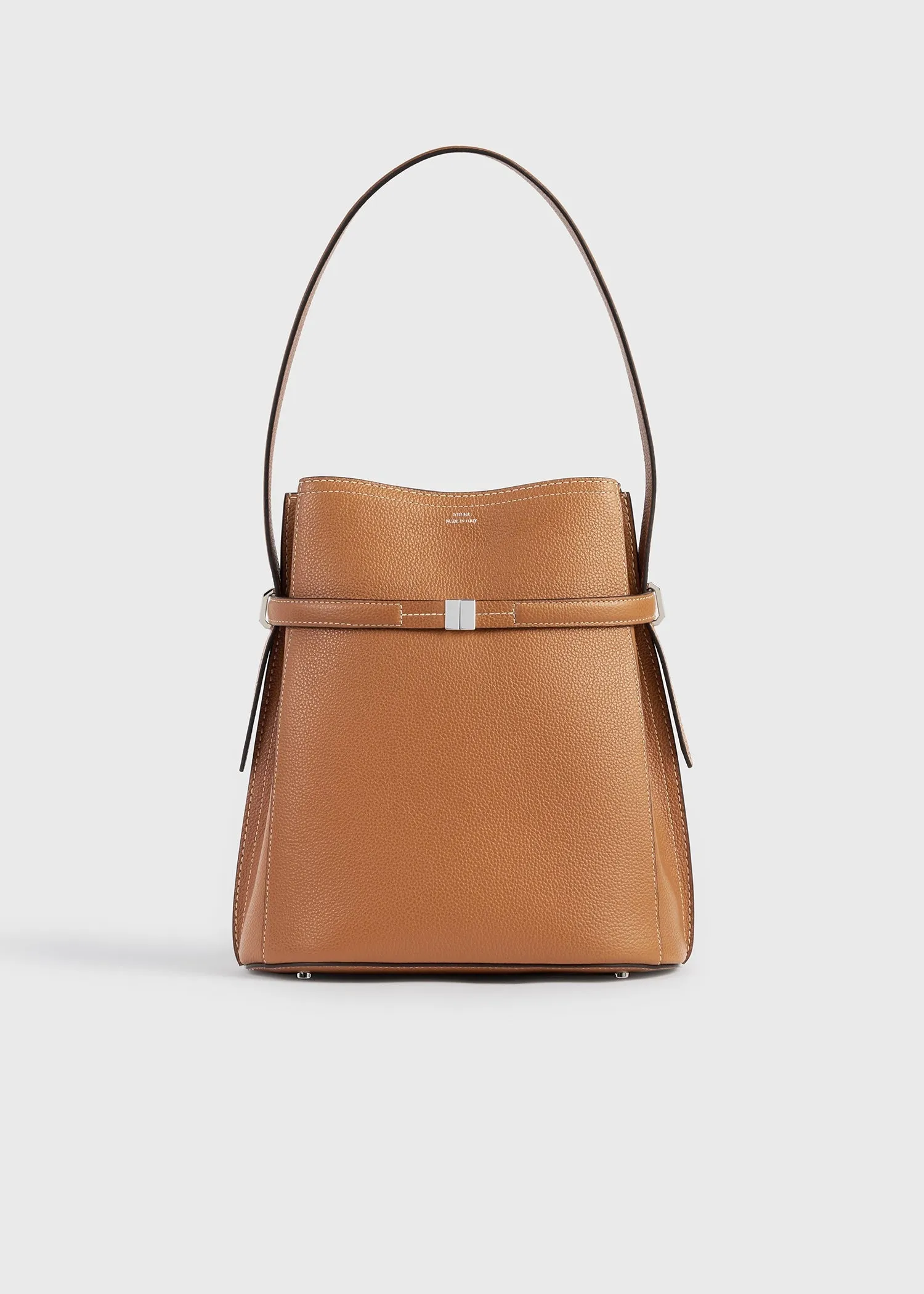 Belted grained-leather bucket bag tan sold by Toteme