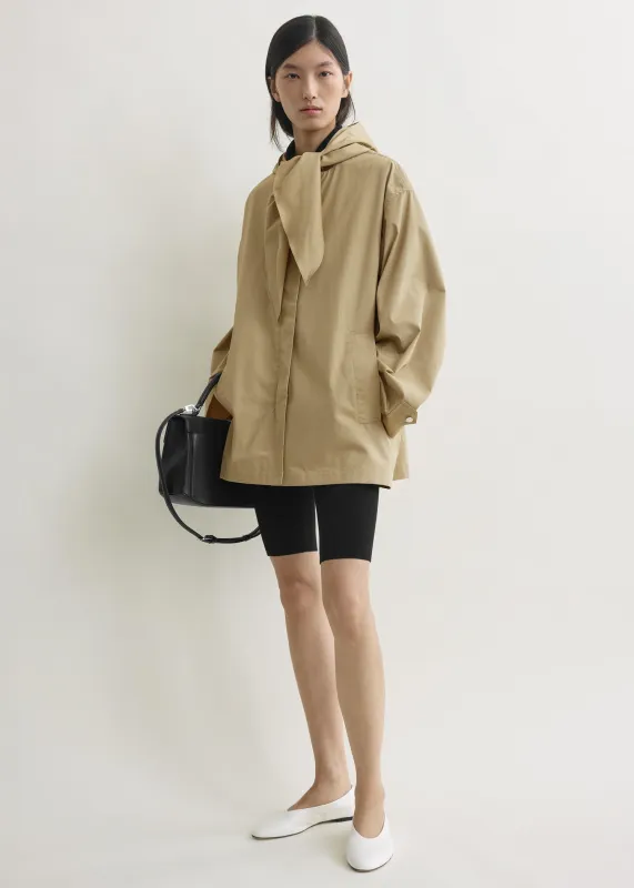 Technical scarf jacket cashew sold by Toteme