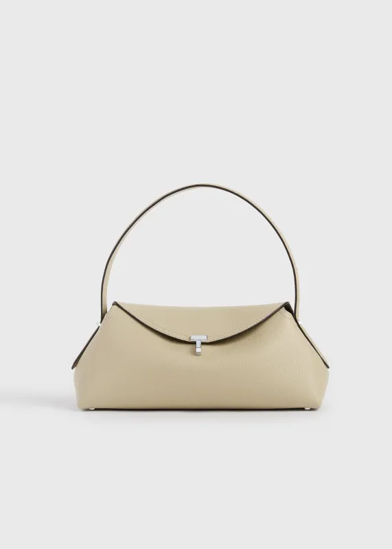 T-lock grained-leather shoulder cashew made by Toteme