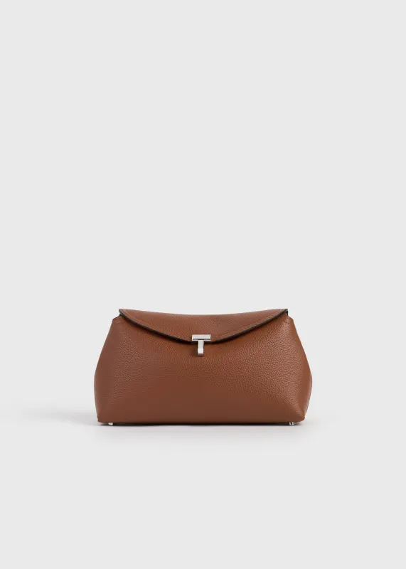 T-lock grained-leather clutch sienna sold by Toteme