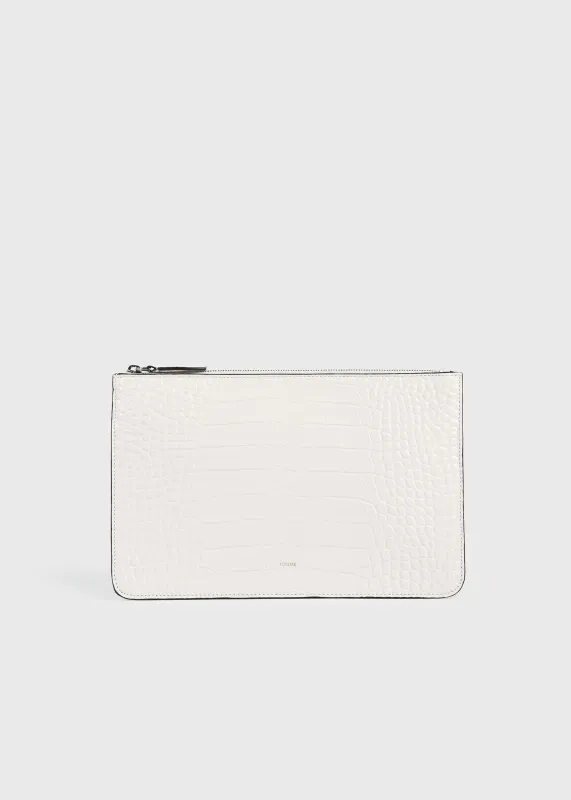 Threefold croco-embossed clutch off-white made by Toteme