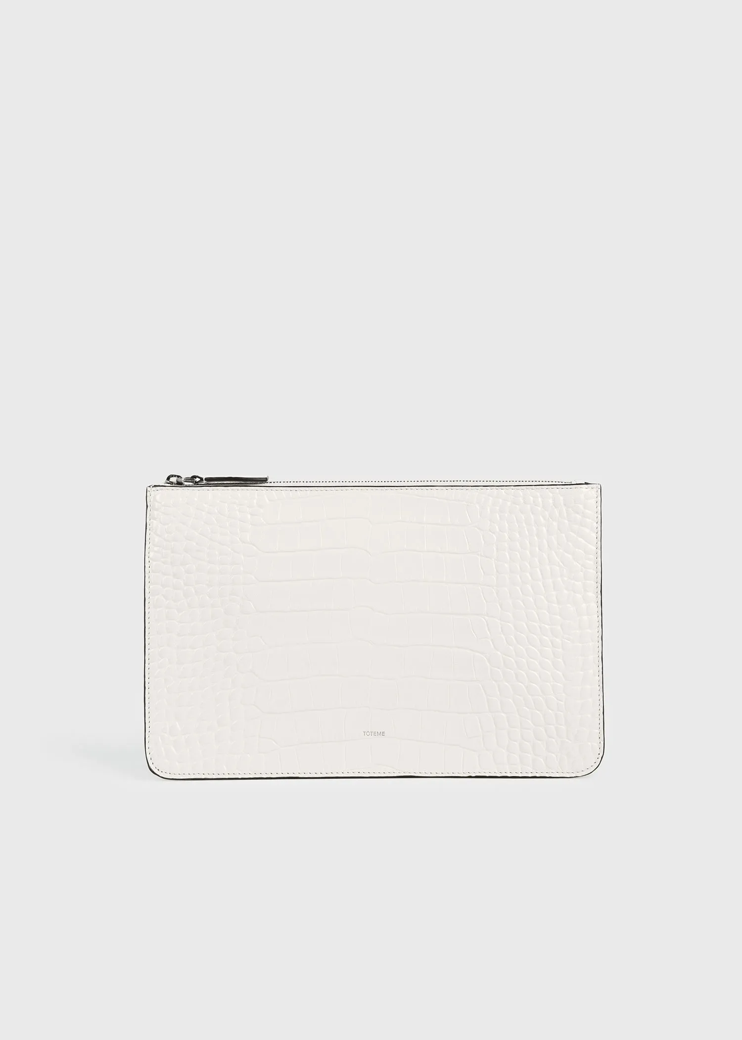 Threefold croco-embossed clutch off-white sold by Toteme