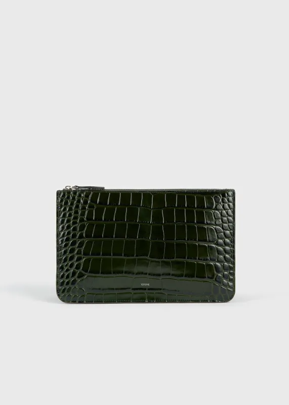 Threefold croco-embossed clutch dark green made by Toteme