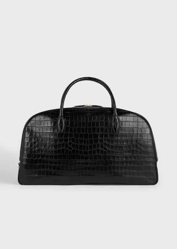 Croco-embossed traveler black sold by Toteme