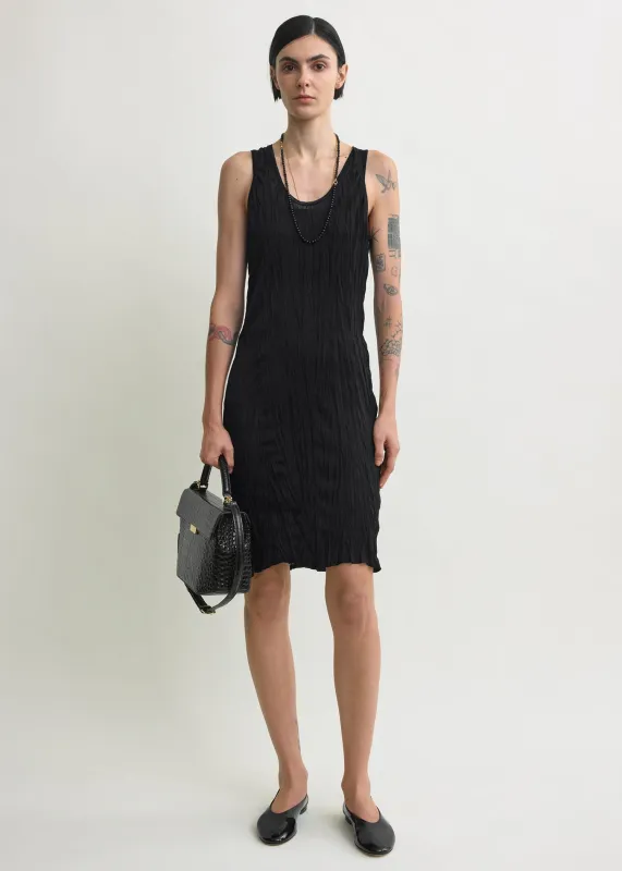 Crinkled knit tank dress black sold by Toteme