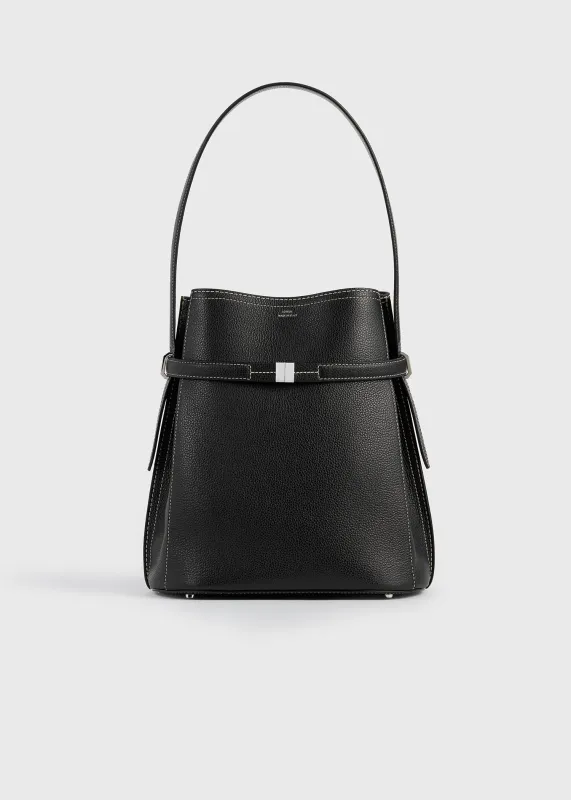 Belted grained-leather bucket bag black made by Toteme