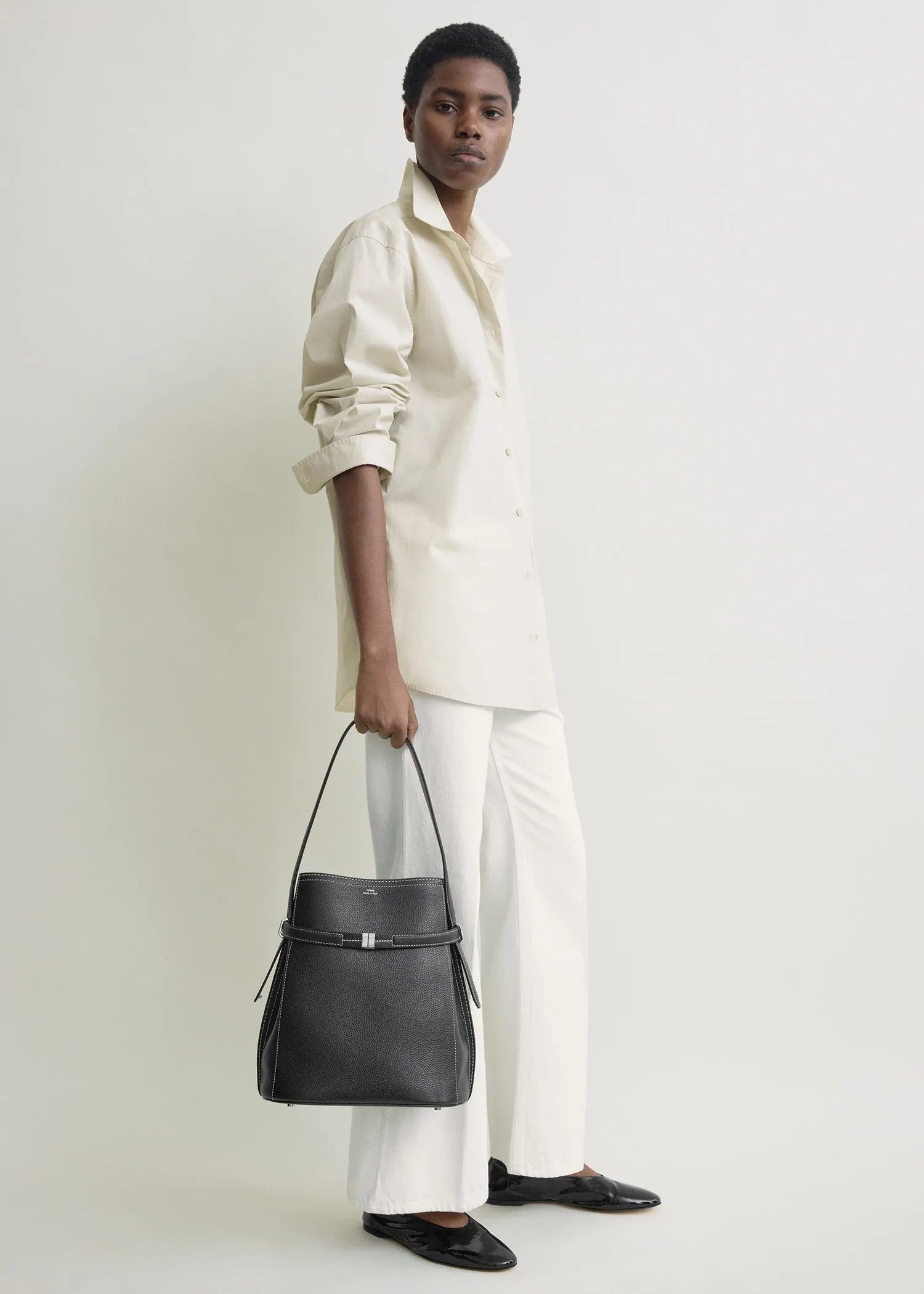 Belted grained-leather bucket bag black sold by Toteme product image thumbnail 3