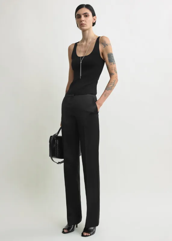 Easy raw edge trousers black sold by Toteme
