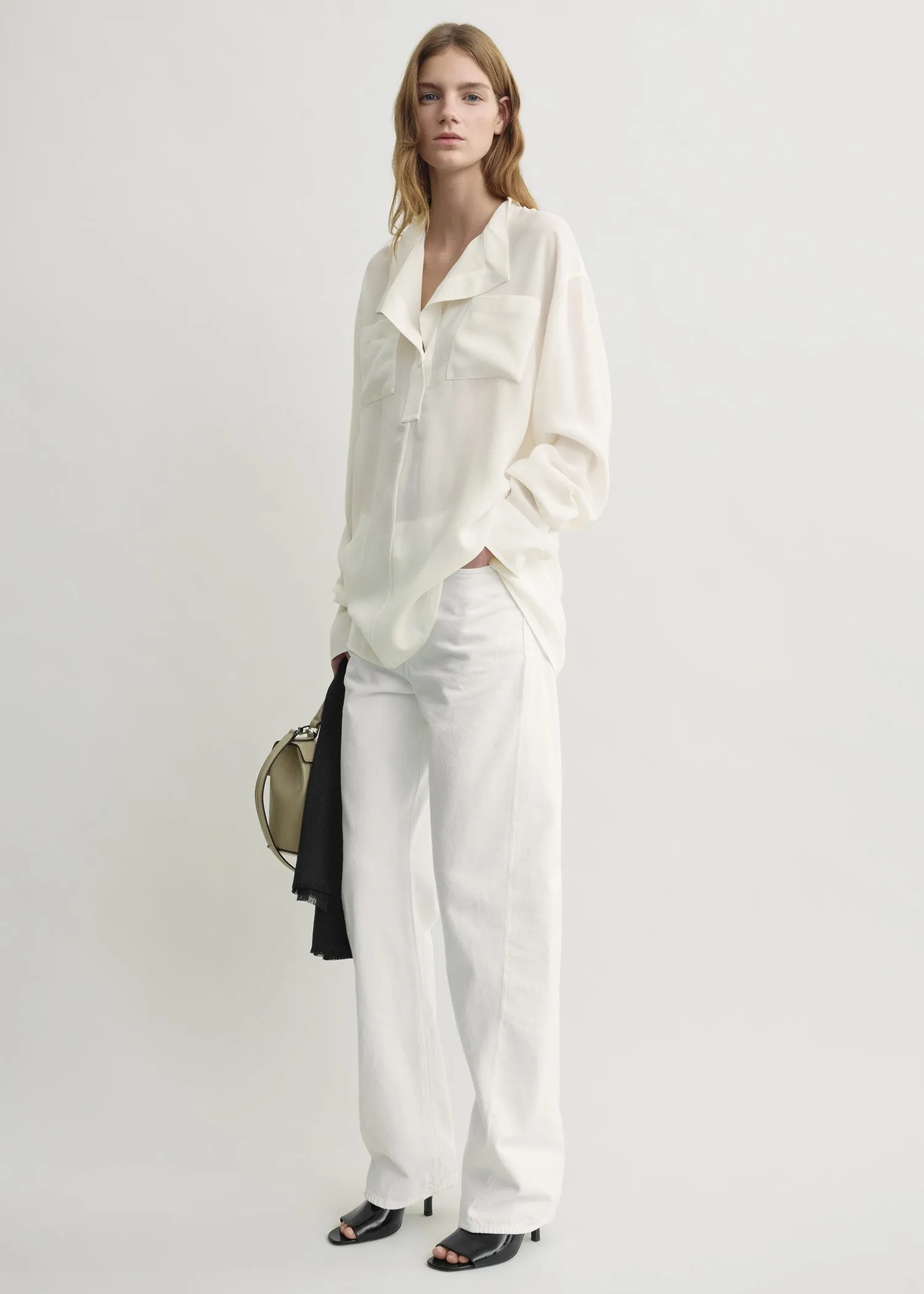 Overlapping collar blouse milk sold by Toteme