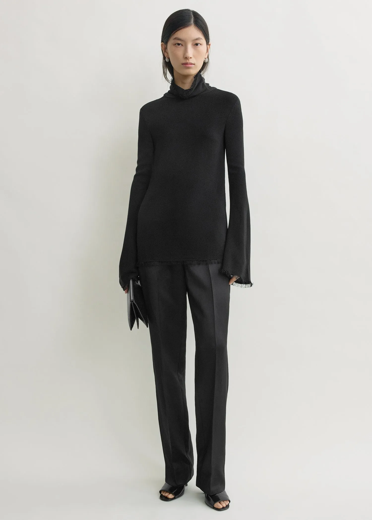 Frayed-edge slim top black sold by Toteme