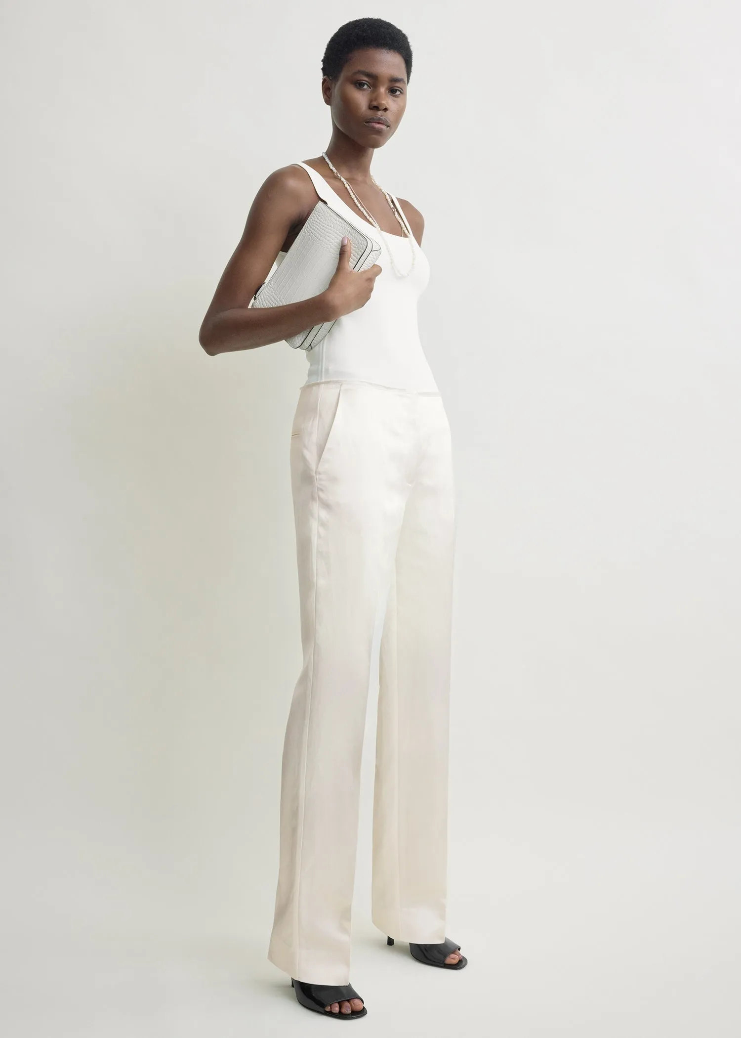 Easy raw edge trousers white sold by Toteme