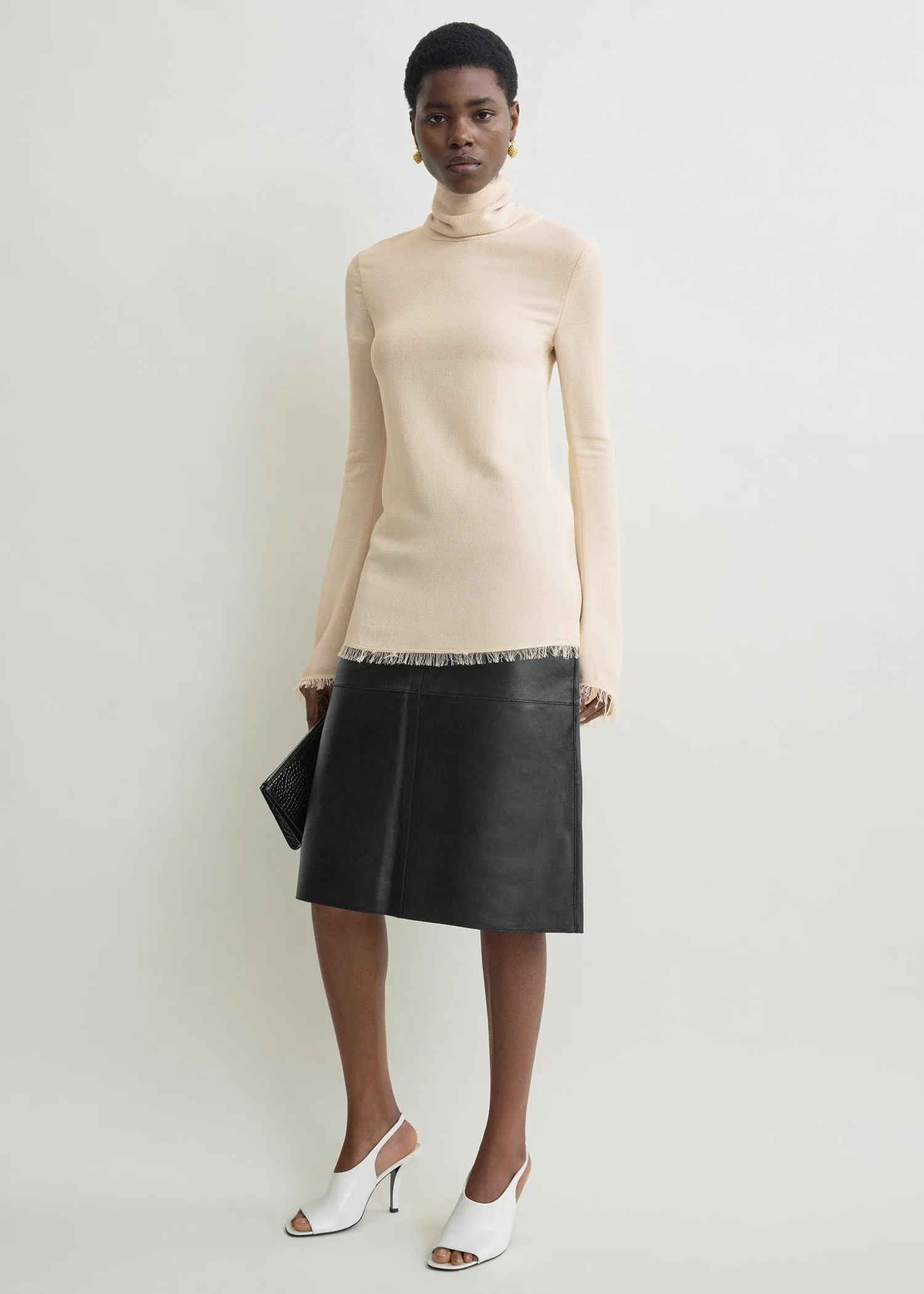 Frayed-edge slim top stone sold by Toteme