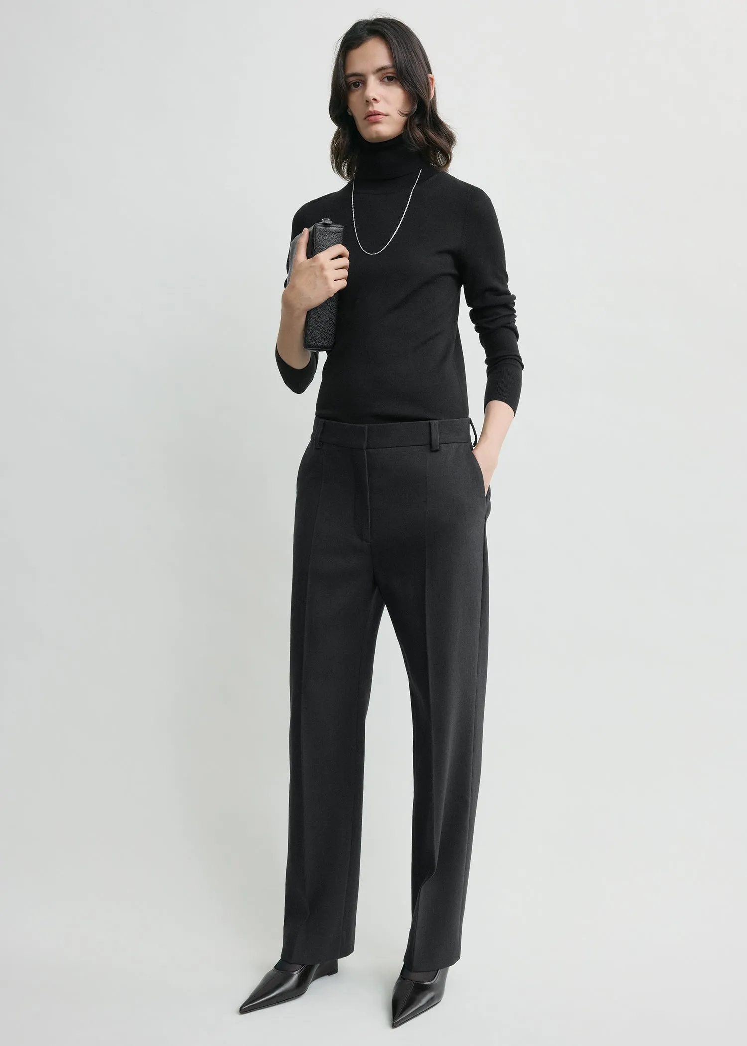 Cropped suit trousers washed black sold by Toteme