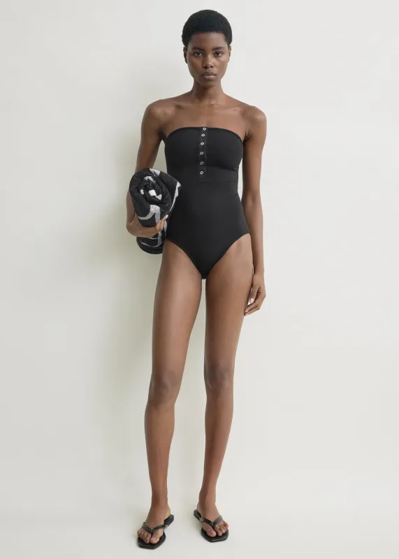 Ribbed strapless swimsuit black made by Toteme