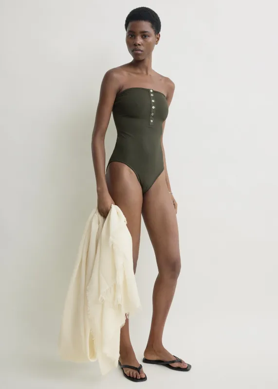 Ribbed strapless swimsuit dark green sold by Toteme