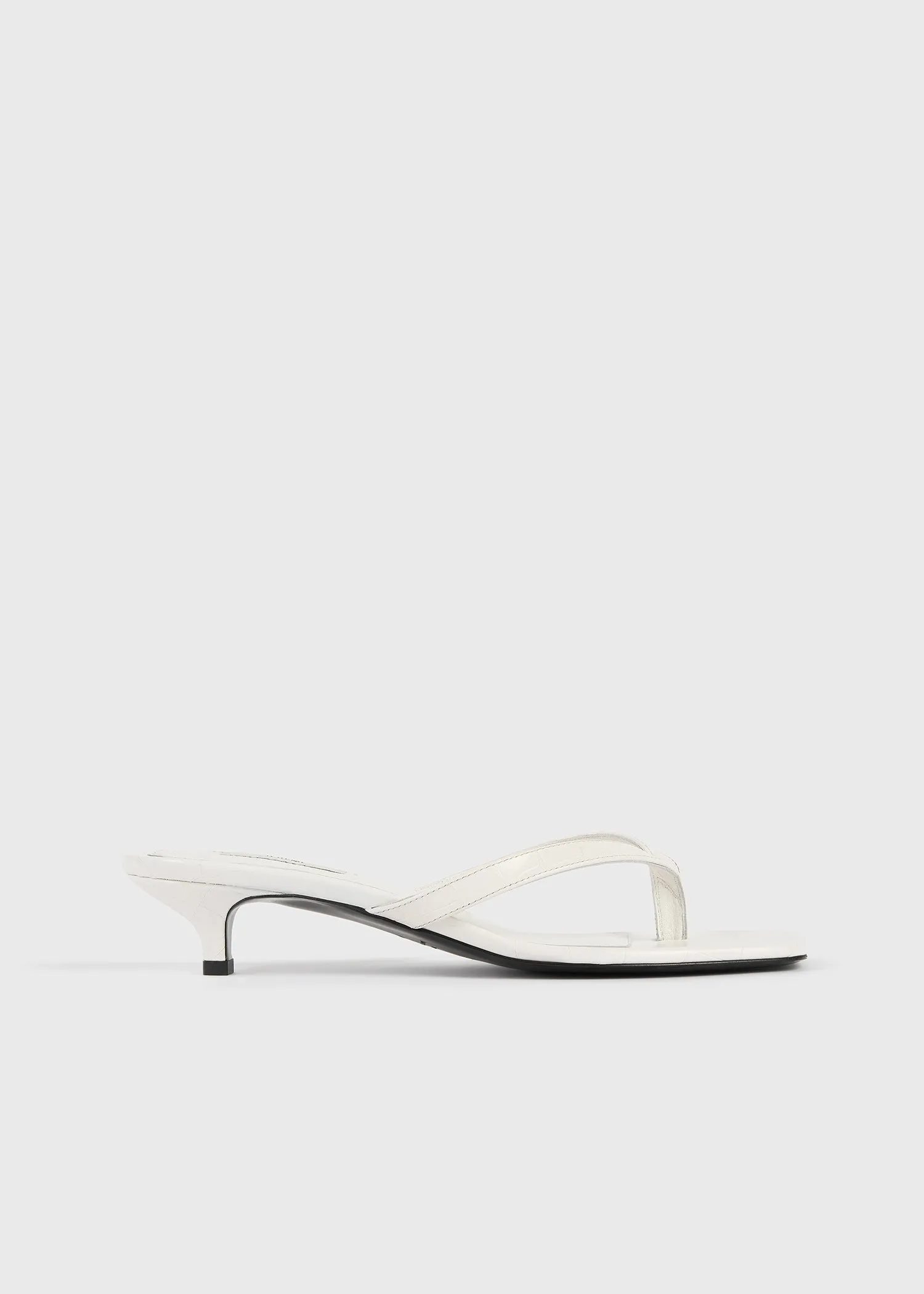 Croco-embossed heeled flip flops off-white sold by Toteme