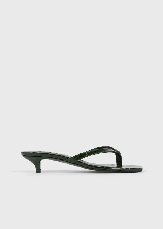 Croco-embossed heeled flip flops dark green sold by Toteme