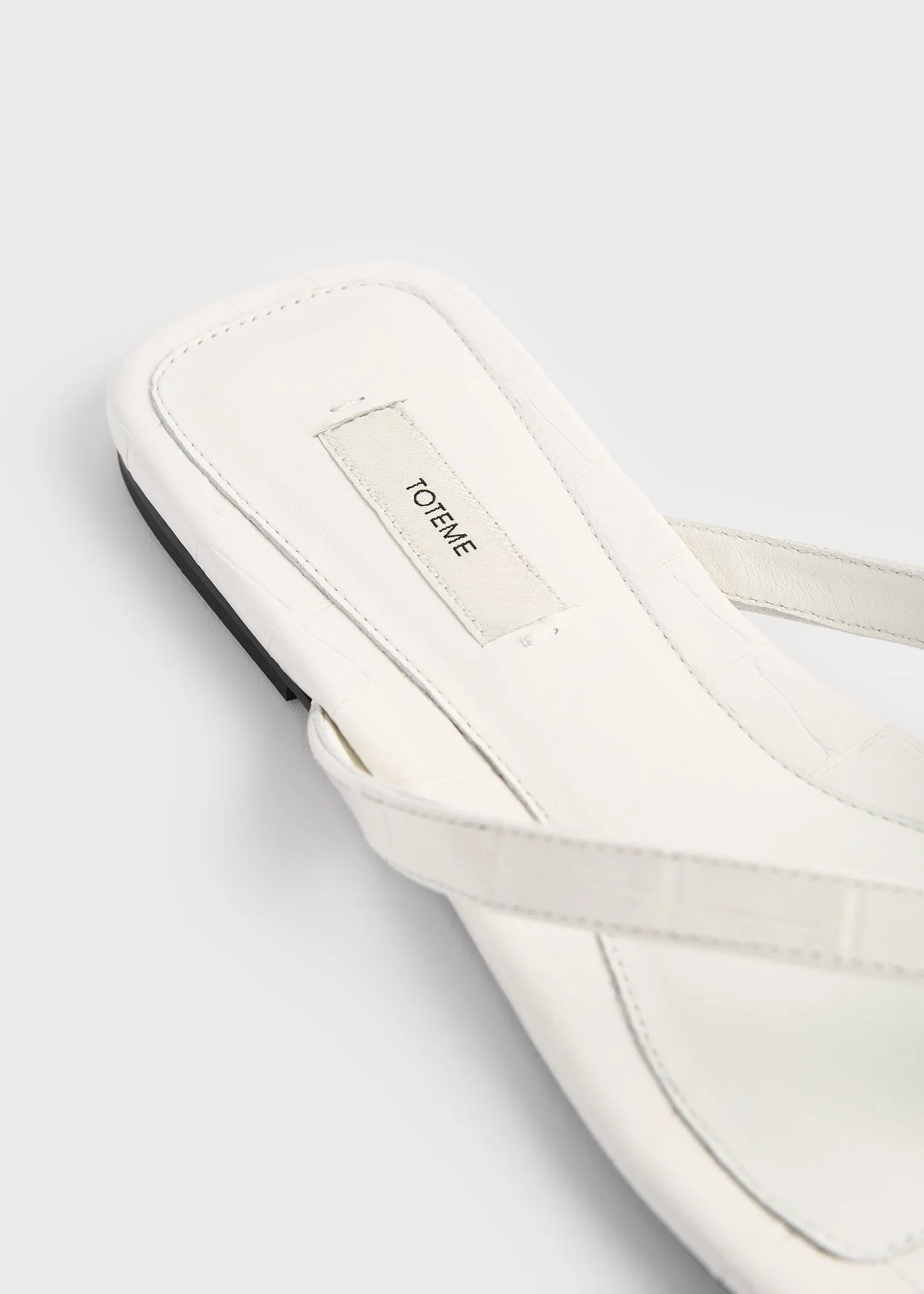 Croco-embossed flip flops off-white sold by Toteme product image thumbnail 5