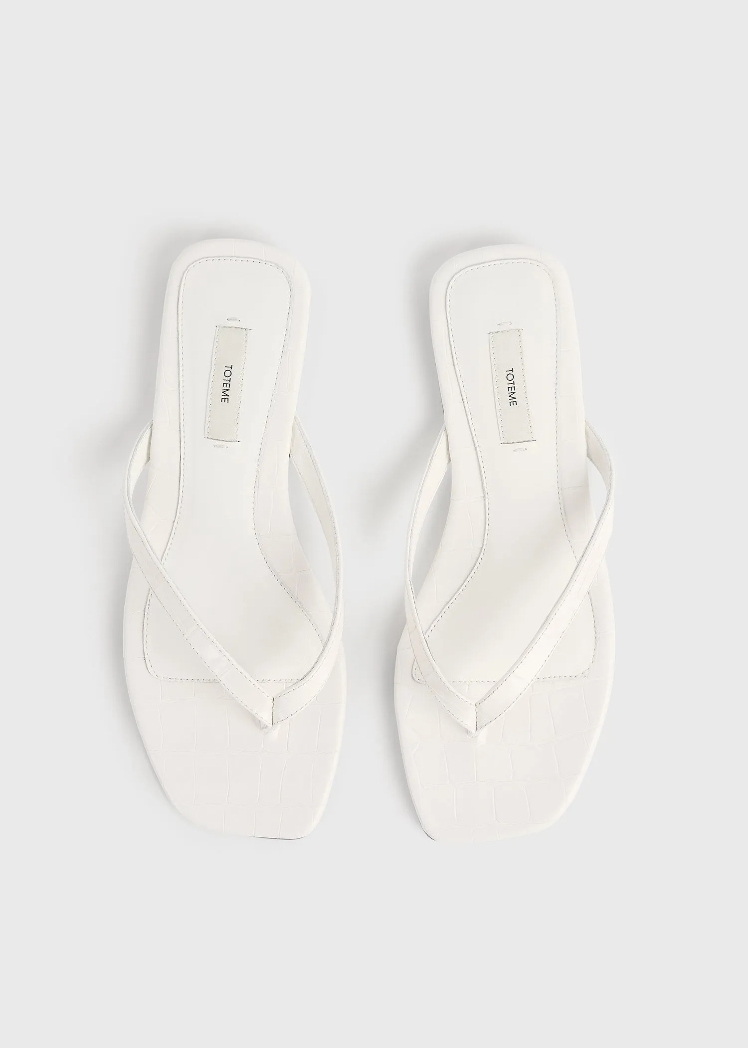 Croco-embossed flip flops off-white sold by Toteme product image thumbnail 4